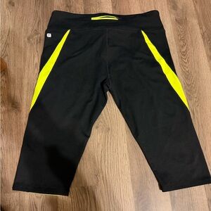 Fabletics Black Capri Leggings with Neon Yellow Panels